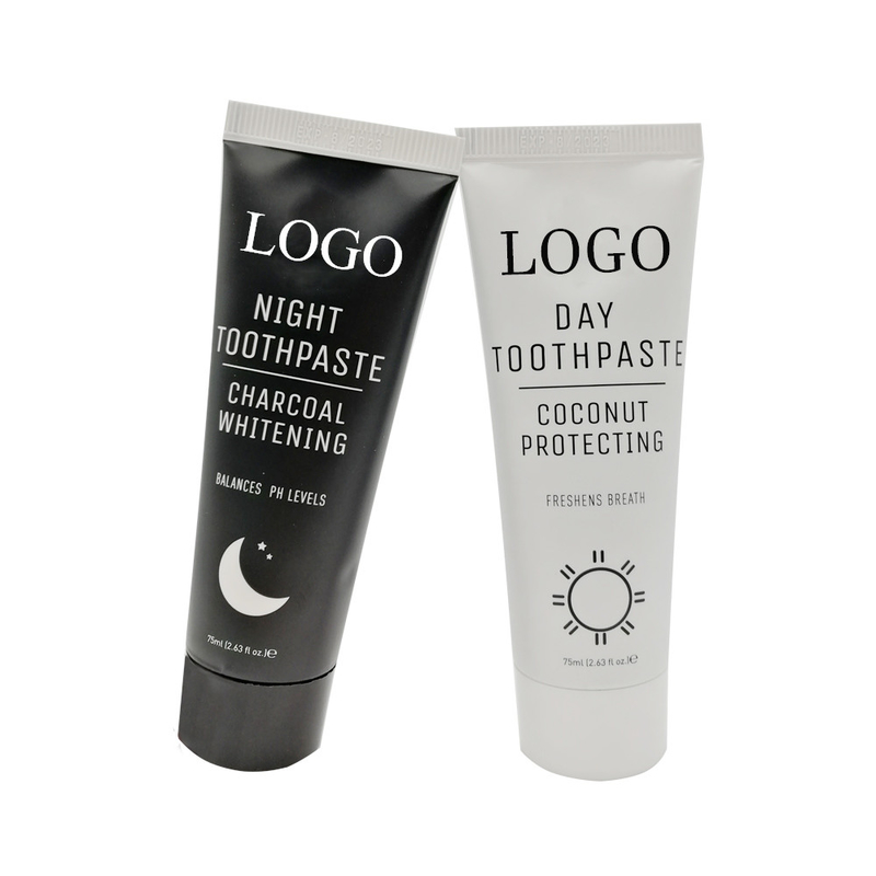 Dents libres de fluorure blanchissant le charbon de bois noir de pâte blanche de noix de coco de pâte dentifrice jour et nuit