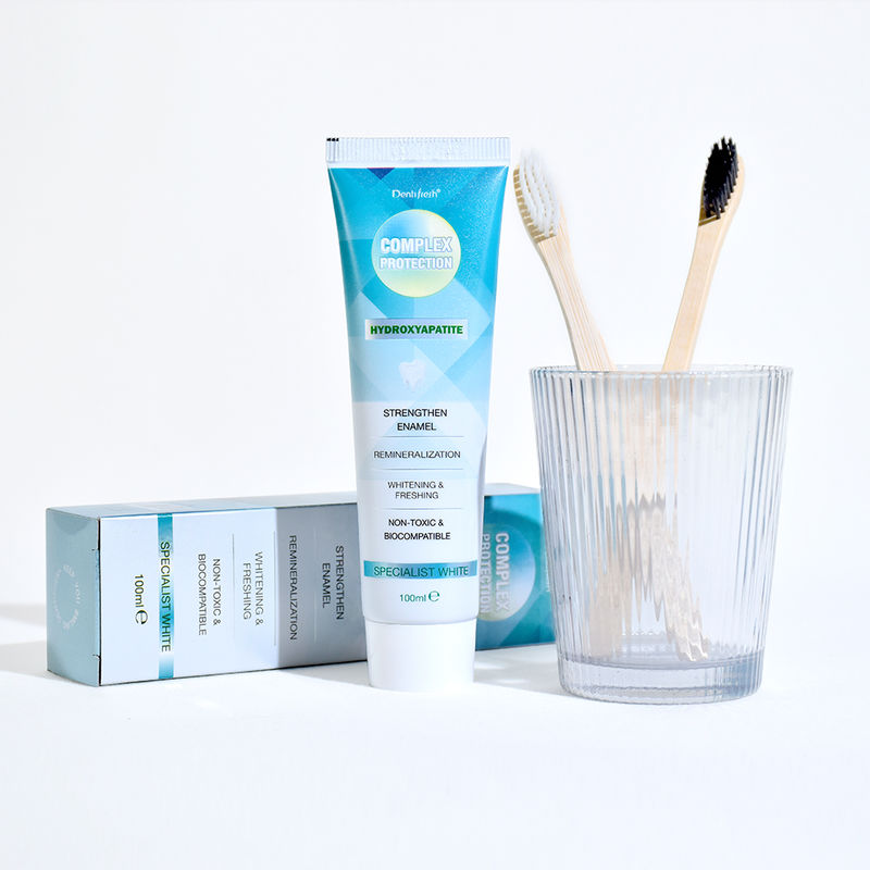 Effets blanchissants modérés Les dents Les dentifrices blanchissants avec brosse à dents deux fois par jour et les ingrédients de phytate de sodium